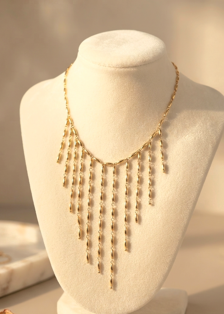 Collar Flecos Dorados Toa