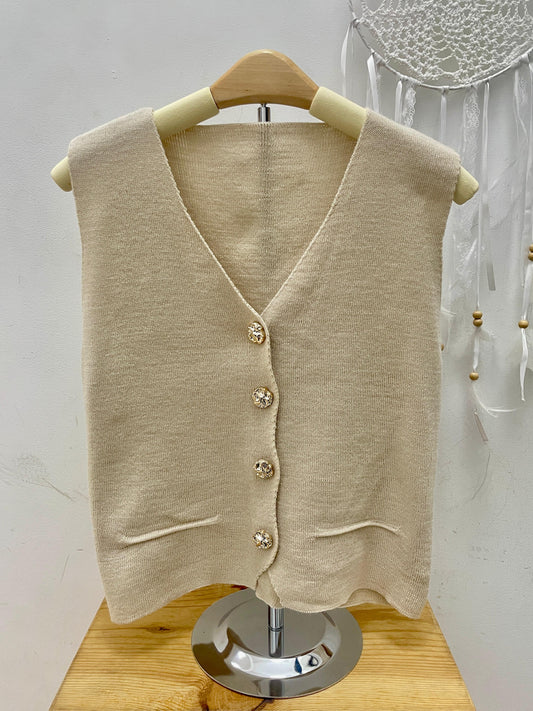 Chaleco con botones dorados esUnic