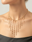 Collar Flecos Dorados Toa